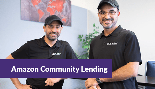 Two small business owners participating in the Amazon Community Lending program smiling