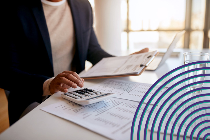 Person reviewing financial planning for their small business