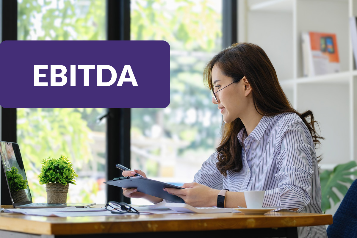 Female Business Owner calculating EBITDA